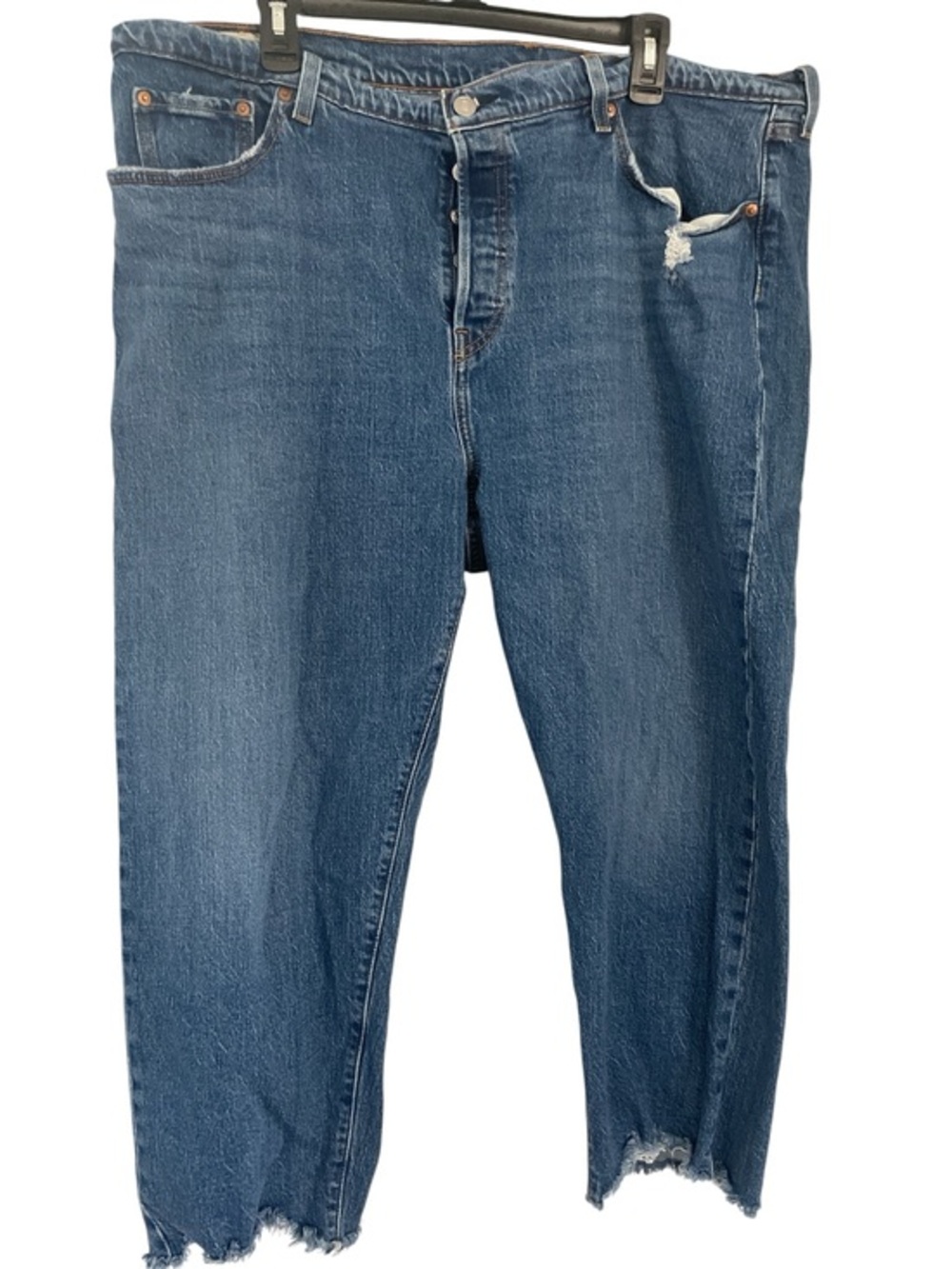 Levi’s medium wash. raw hem straight leg jeans size 20 W